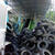 回収された廃タイヤは処理業者工場でタイヤチップ化され、サーマルリサイクル（熱利用）などに利用される（東建テクロードの処理工場で）
