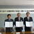 協定書を掲げる左から高橋支部長、菅原気仙沼市長、伊藤支部長