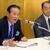 記者らの質問に答える森会長（左）と加藤庸之副会長・専務理事