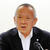 あいさつする柳田会長