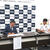 協定書に調印する玉城理事長（左）と渡邉司令