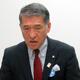 会議冒頭であいさつする亀井理事長